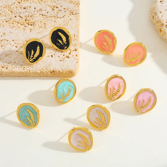 pendientes 304 acero inoxidable bañado en oro 18k diseño irregular Loyobriyida fondo blanco