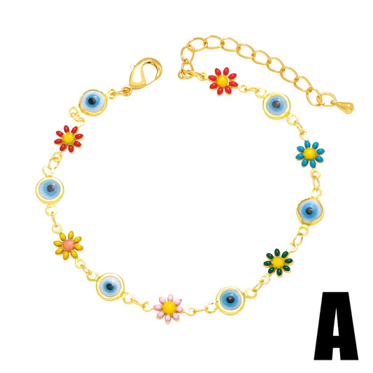 pulsera cobre bañado en oro diseño devil's eye Loyobriyida fondo blanco