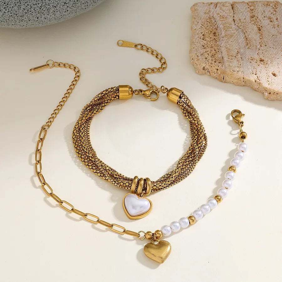 pulsera 304 acero inoxidable bañado en oro 18k con imitación perla Loyobriyida fondo blanco
