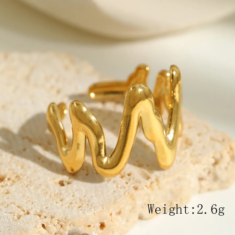 anillo abierto 304 acero inoxidable bañado en oro 18k diseño geométrico Loyobriyida fondo blanco