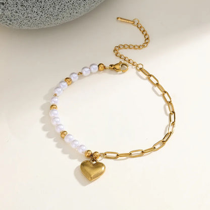 pulsera 304 acero inoxidable bañado en oro 18k con imitación perla Loyobriyida fondo blanco
