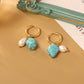 pendientes artificial perla bañado en oro diseño irregular Loyobriyida fondo blanco