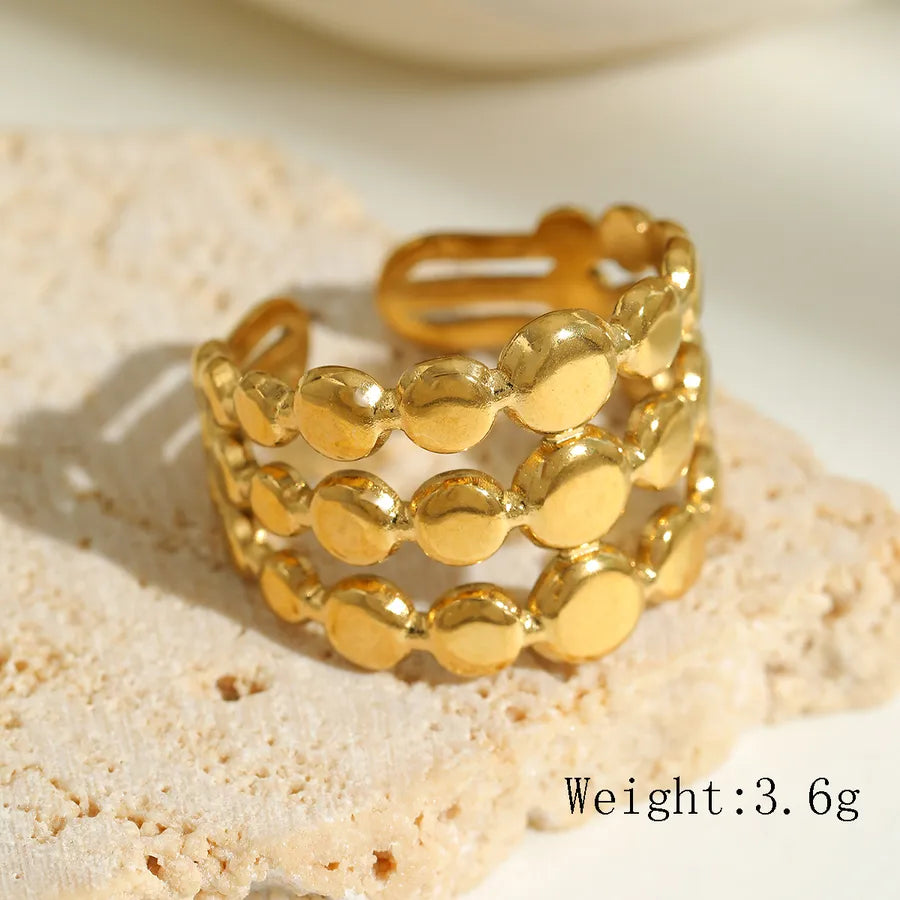 anillo abierto 304 acero inoxidable bañado en oro 18k diseño geométrico Loyobriyida fondo blanco