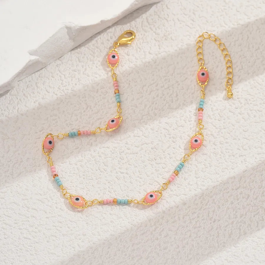 tobillera cobre bañado en oro 18k con ceramics Loyobriyida fondo blanco