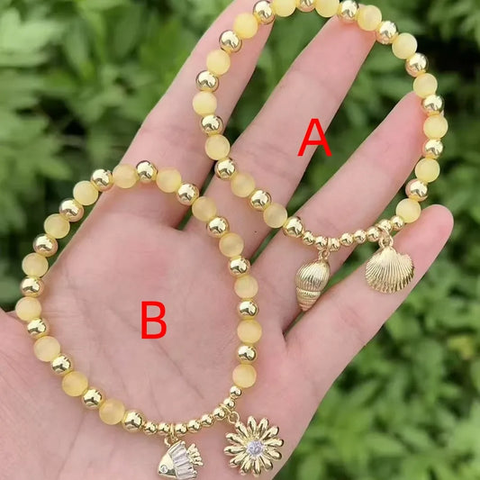 pulsera cristal bañado en oro 18k con circón Loyobriyida fondo blanco