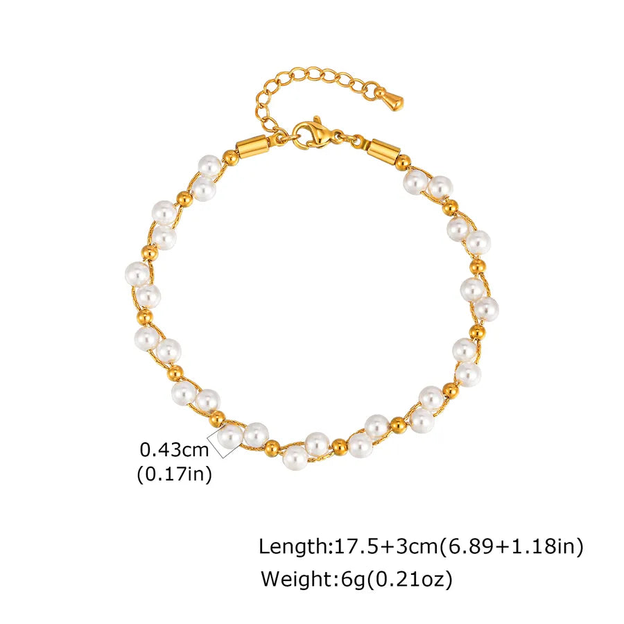 pulsera 201 acero inoxidable bañado en oro 18k diseño lazo Loyobriyida fondo blanco