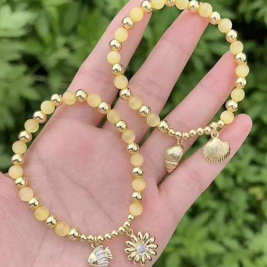 pulsera cristal bañado en oro 18k con circón Loyobriyida fondo blanco