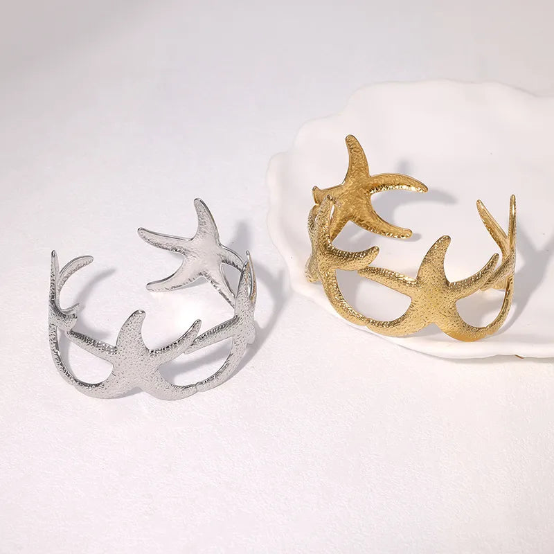 pulsera 304 acero inoxidable bañado en oro 18k diseño estrella de mar Loyobriyida fondo blanco